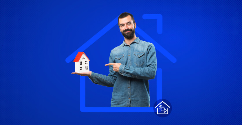 Joven con una casa hablando que se puede trasladar el crédito hipotecario y mejorar sus condiciones